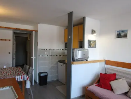 Location appartement à Huez, Studio cosy pour 5 pers. à 100m des pistes - Balcon sud, animaux acceptés, près commerces - Alpe dHuez
