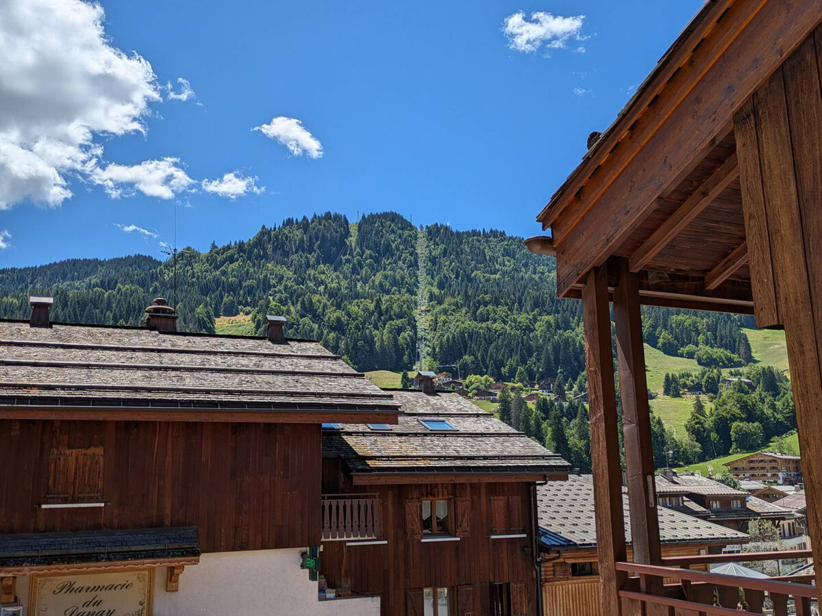 Studio 4 pers centre La Clusaz, balcon sud vue village - Photo 11