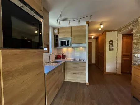 Appartement rénové 3 pièces aux pieds des pistes, Les Menuires : photo 4