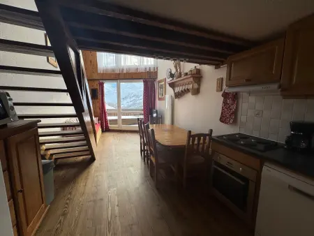 Location appartement à Les Menuires, Duplex mezzanine 8 personnes aux Ménuires, Pratique et Confort
