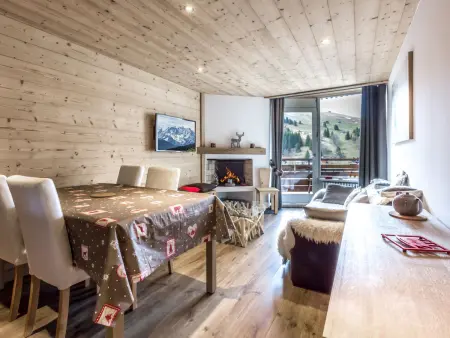 Location appartement à La Clusaz, Appartement cosy, pied de piste, cheminée, animaux admis