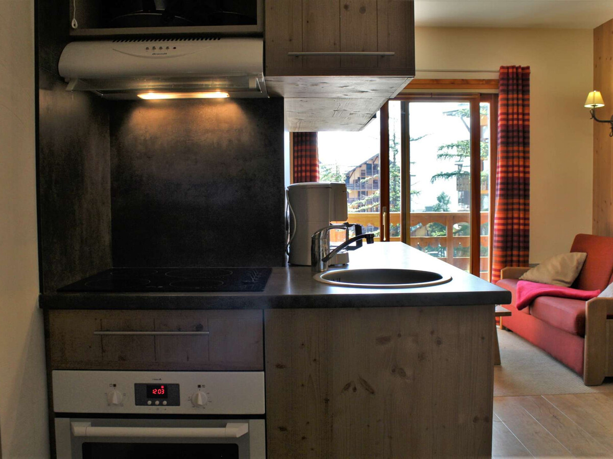 Appartement 2 pièces balcon, piscine et sauna aux pieds des pistes - Photo 9