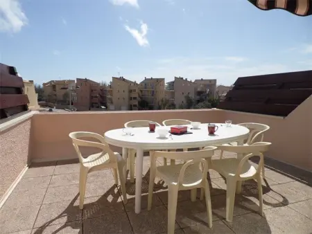 Location appartement à Marseillan Plage, Duplex climatisé avec 2 chambres, grande terrasse et parking privé