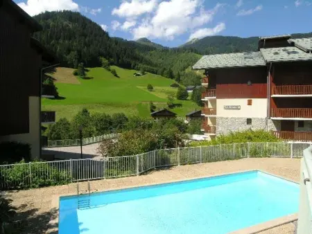Location appartement à Arêches Beaufort, Charmant appartement à Arêches-Beaufort avec terrasse, piscine et parking, idéal pour 4 personnes
