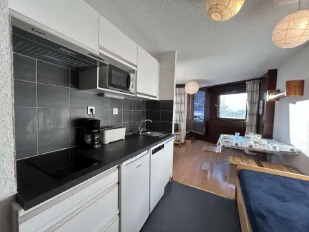 Studio 35 m² Montgenèvre, balcon vue pistes + parking : photo 14