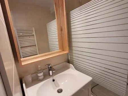 T3 duplex lumineux aux Gets, vue pistes, parking : photo 14