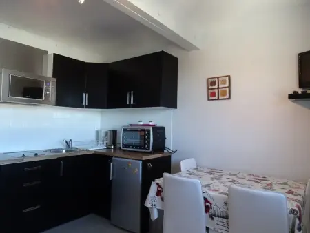 Location appartement à Arette, Studio cosy 4 pers, ski aux pieds, casier à skis, parkings gratuits, équipement complet inclus.