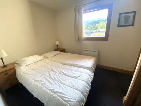 Duplex 3 chambres 8 pers. à Morillon, parking couvert : photo 10