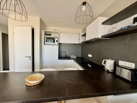 Appartement 56m² front de mer, piscine chauffée, parking : photo 13