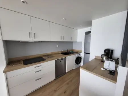 Appartement T2 face plage avec balcon, cuisine équipée et TV - Photo 5