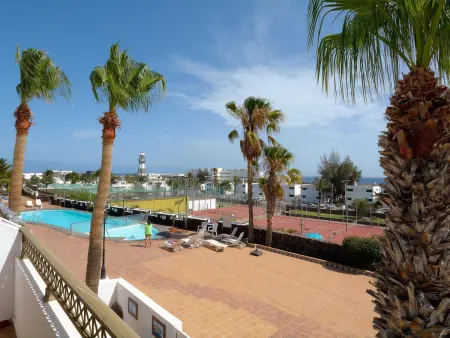 Location appartement à Puerto del Carmen, Appartement à Puerto del Carmen avec Piscine, Climatisation, Proche Plage et Attractions