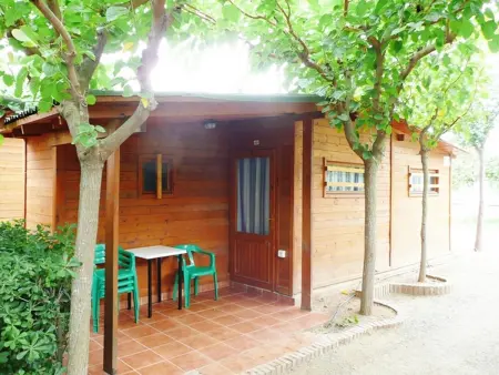 Location bungalow à Miami Platja, Bungalow en bois près de la plage avec piscine, parking et animaux admis