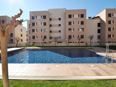 Location appartement à Lloret de Mar, Appartement avec grande terrasse, climatisation, piscine et parking à 300m de la plage