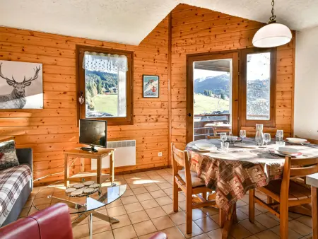Location appartement à Les Gets, Duplex ensoleillé près télécabine Mont Chéry - 2 chambres, terrasse, parking, proche commodités