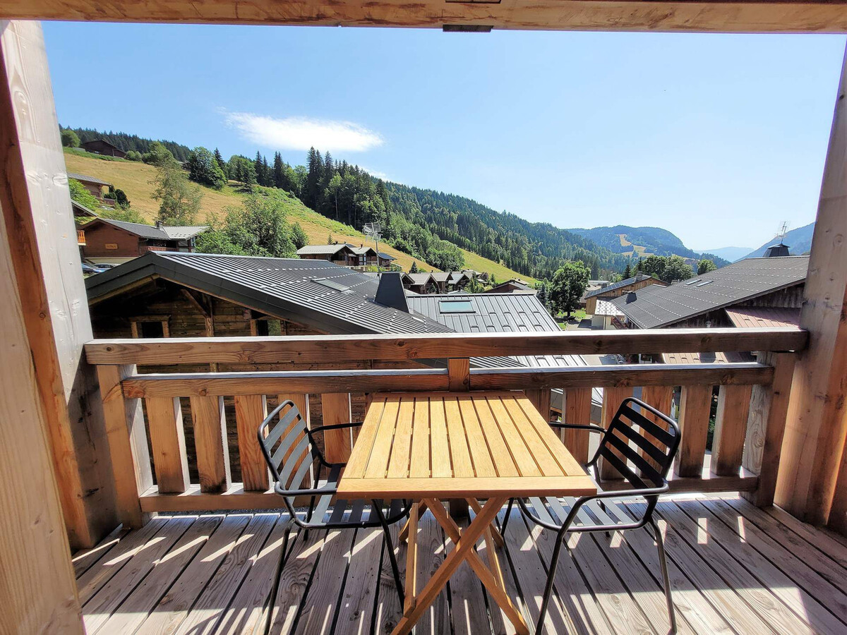 Appartement 88 m² Les Gets, terrasse Sud face aux pistes - Photo 11