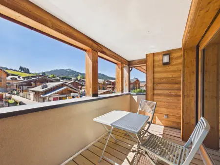 Appartement 4 chambres aux Gets, 108 m², balcon sud-est : photo 15