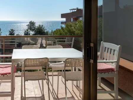 Location appartement à Torredembarra, AT049 Els Pins II: Apartamento con piscina en primera línea