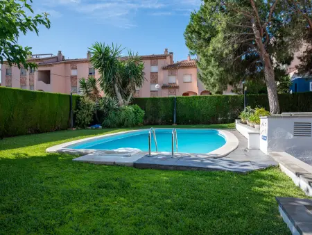 Location appartement à Torredembarra, AT005 Pàndols:  Planta baja con terraza y piscina a 600 metros de la playa