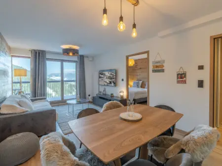 Bel appartement familial avec retour skis aux pieds et parking à Courchevel 1650 : photo 3