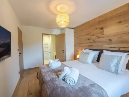 Bel appartement familial avec retour skis aux pieds et parking à Courchevel 1650 : photo 4