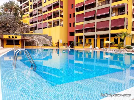 Location appartement à Puerto de Santiago, Bel appartement moderne à Playa de La Arena avec terrasse et piscine