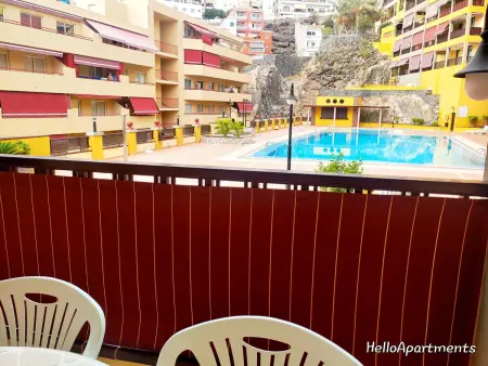 Appartement moderne Puerto de Santiago, terrasse vue piscine : photo 7
