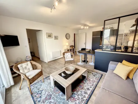 Location appartement à Jullouville, Appartement cosy bord de mer avec jardinet, garage et WiFi