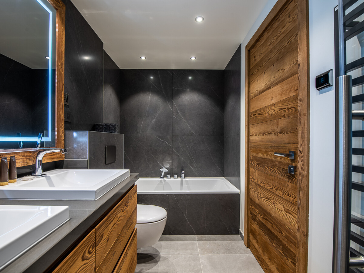 Appartement 4 chambres avec jacuzzi, hammam et conciergerie 5* à Méribel - Photo 11
