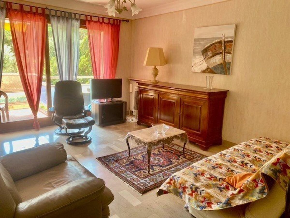 F2 traversant 54 m² avec terrasse sud et parking - Photo 1