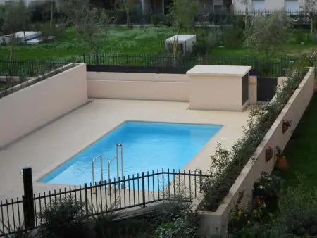 3 pièces climatisé avec terrasse, piscine et garage : photo 15