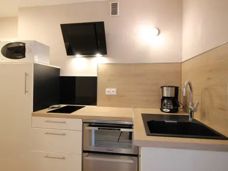 T2 rénové 35m² avec balcon et parking au Mont-Dore : photo 3