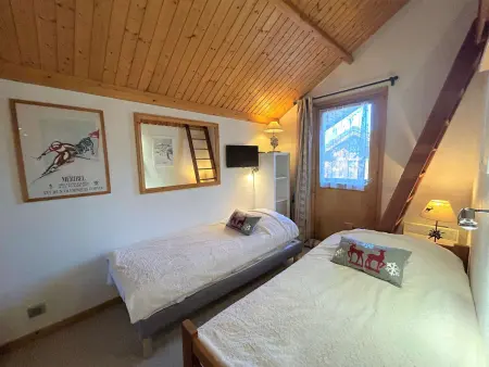 Appartement 4 pièces skis aux pieds avec cheminée à Méribel : photo 5