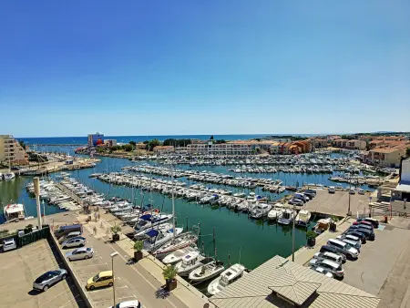 Location appartement à Mauguio, Studio Cabine 4 Pers - Vue Port et Mer - Animaux et Parking Inclus