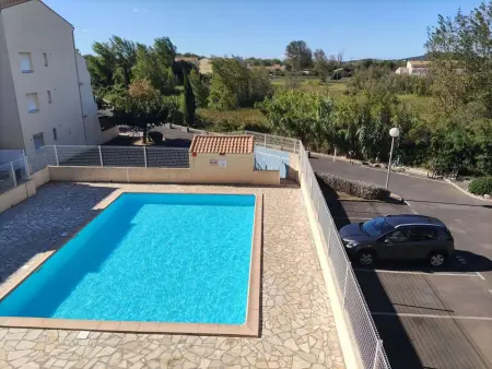 Location appartement à Marseillan Plage, Appartement 2 pièces mezzanine climatisé avec piscine et parking privé à Marseillan