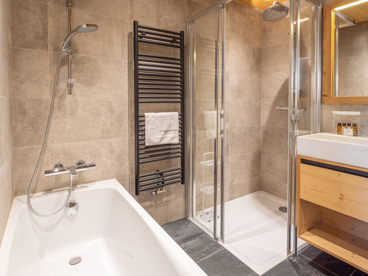 Appartement 130m² ski in/ski out, piscine & sauna à Huez - Photo 4
