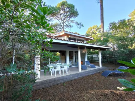 Location villa à Lège Cap Ferret, Villa en lisière de forêt avec jardin, à 1,5 km de lOcéan, idéale pour des vacances reposantes
