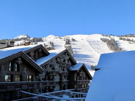 Courchevel 1850 : Élégant Duplex avec Cheminée et WiFi : photo 13