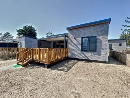 Location chalet à Jullouville, Chalet cosy 4 pers - Piscine chauffée - Proche plage et commerces - Terrasse et jardin privés