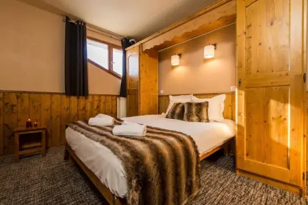Location appartement à Val Thorens, Retraite boisée dans les Alpes