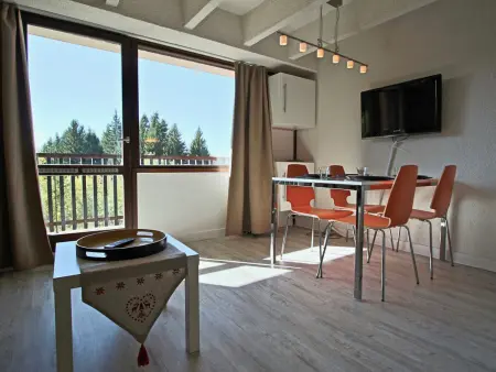 Location appartement à Chamrousse, Studio cabine avec balcon et parking couvert