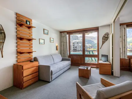 Location appartement à Val d'Isère, Appart cosy skis aux pieds avec parking et wifi, animaux admis à La Daille