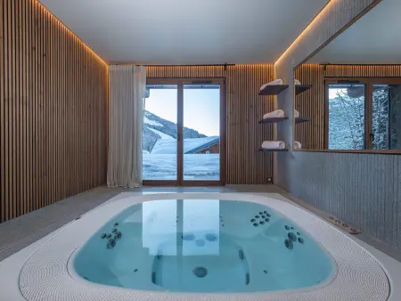 Chalet de luxe avec jacuzzi et vues panoramiques à Courchevel 1650 : photo 8