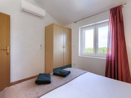 Maison Enka à Banjole : piscine chauffée, 10 personnes : photo 37