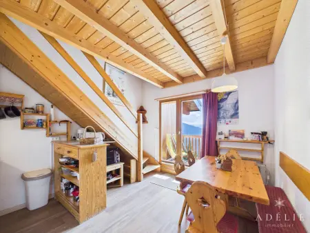 Location appartement à Montvalezan La Rosière, Studio mezzanine au pied des pistes avec balcon, idéal pour 4-6 personnes