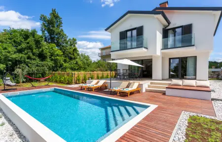 Location maison à Jurdani