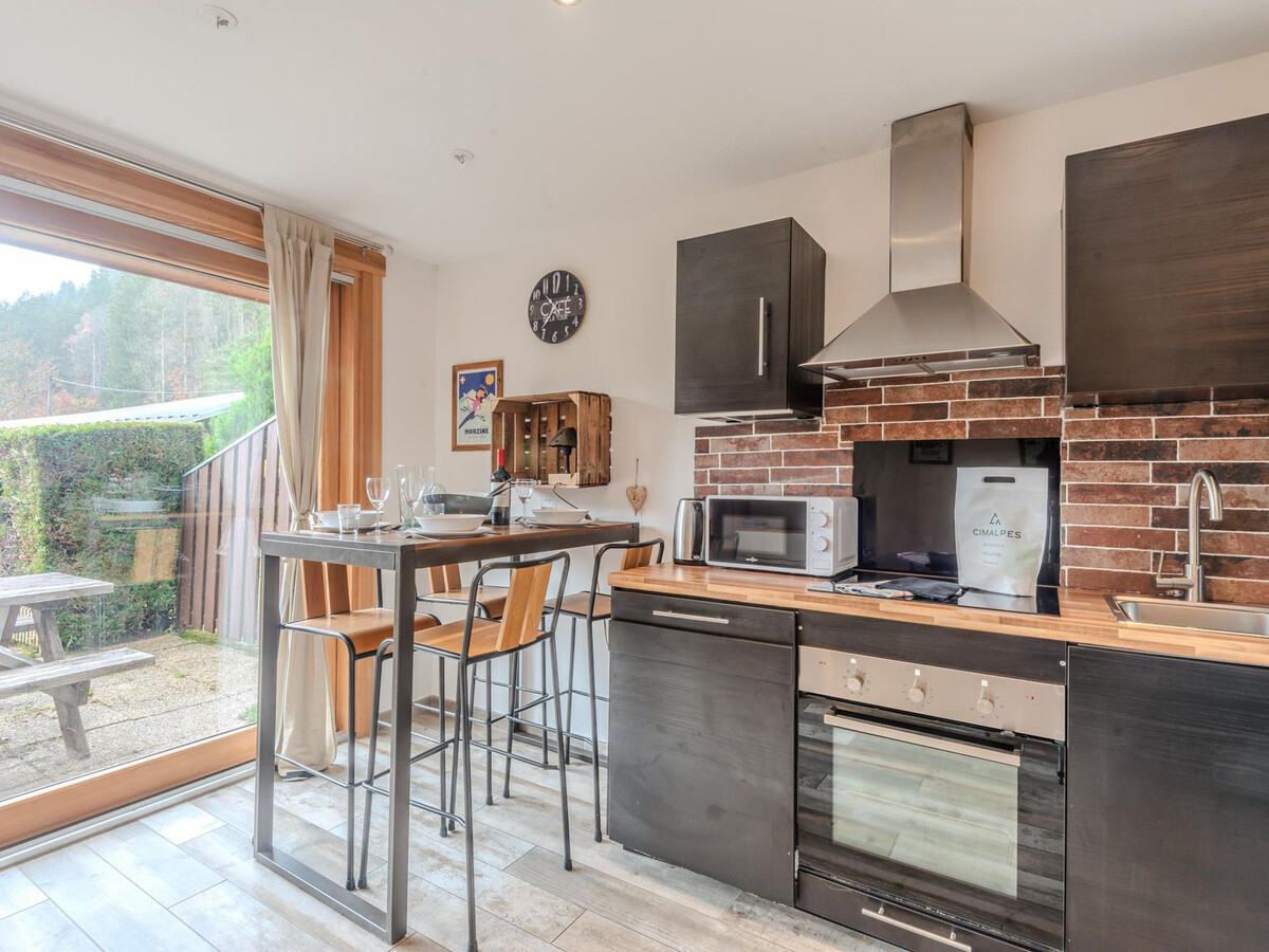 T2 31m² avec terrasse et garage à Morzine - Photo 3