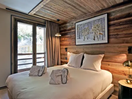 Appartement 3 chambres skis aux pieds, conciergerie 5* : photo 8