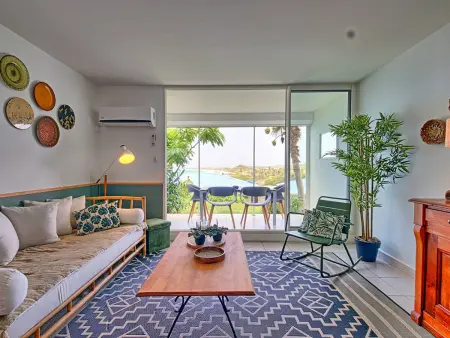 Location appartement à Saint Martin , Studio Bambou à deux pas de la plage dOrient Bay