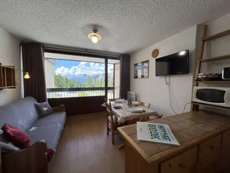 Location appartement à Montgenèvre, Studio cosy au ski pour 4 avec balcon, parking et wifi à Montgenèvre