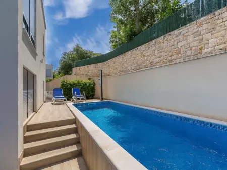Maison Nika à Malinska : piscine chauffée, 350 m de la mer : photo 17